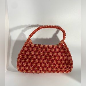 Red and gold beaded bag